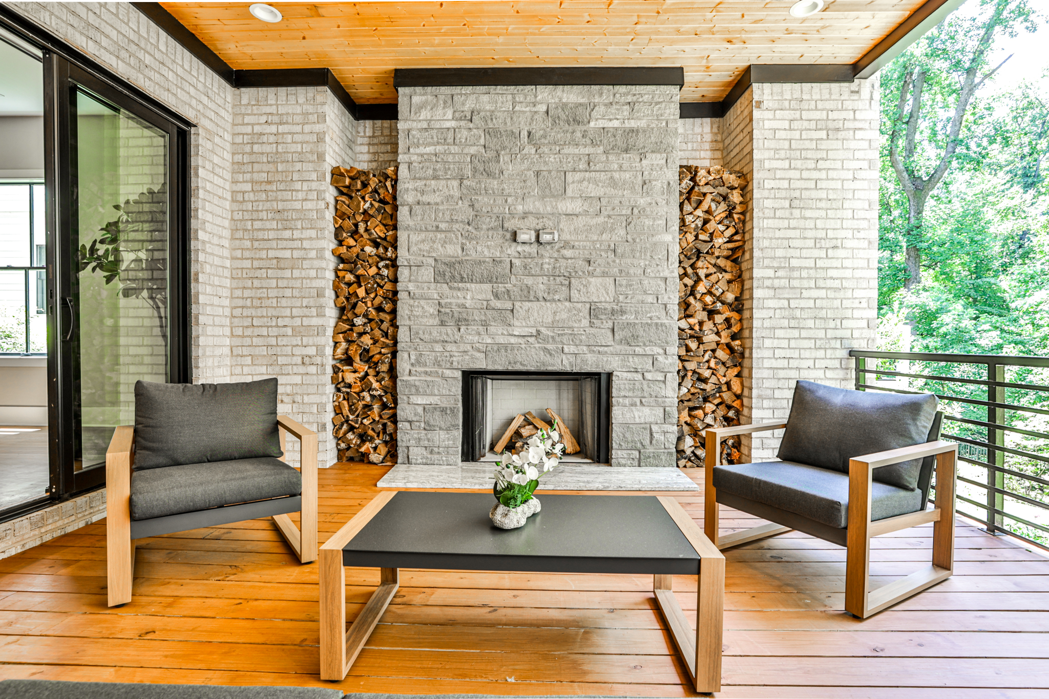 Covered porch fireplace